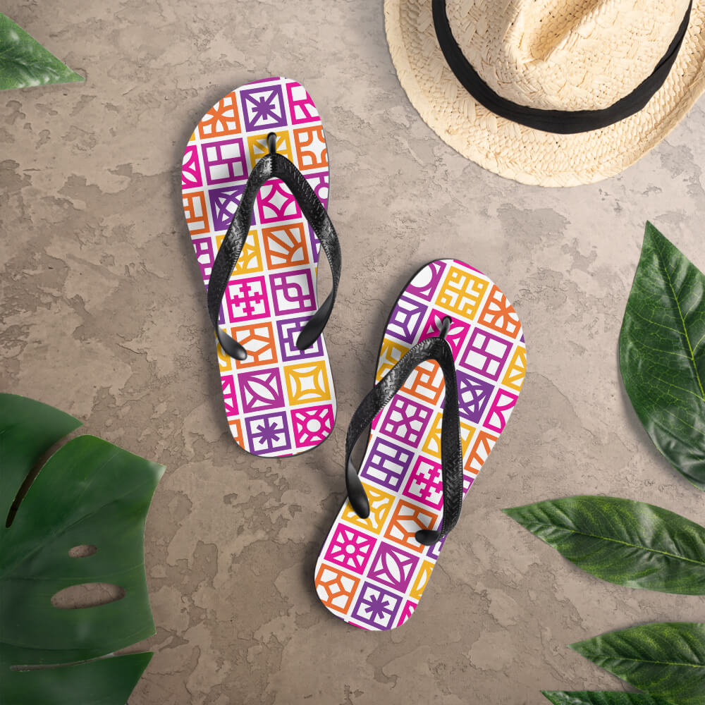 Mid Century Modern Orange Breeze Blocks Flip-Flops on a patio