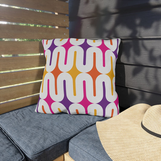 Mid Century Modern Orange Purple Galaxie 18" Outdoor Pillow on a bench