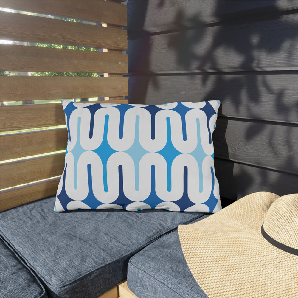 Mid Century Modern Blue Galaxie 20" x 14" Outdoor Pillow on a bench