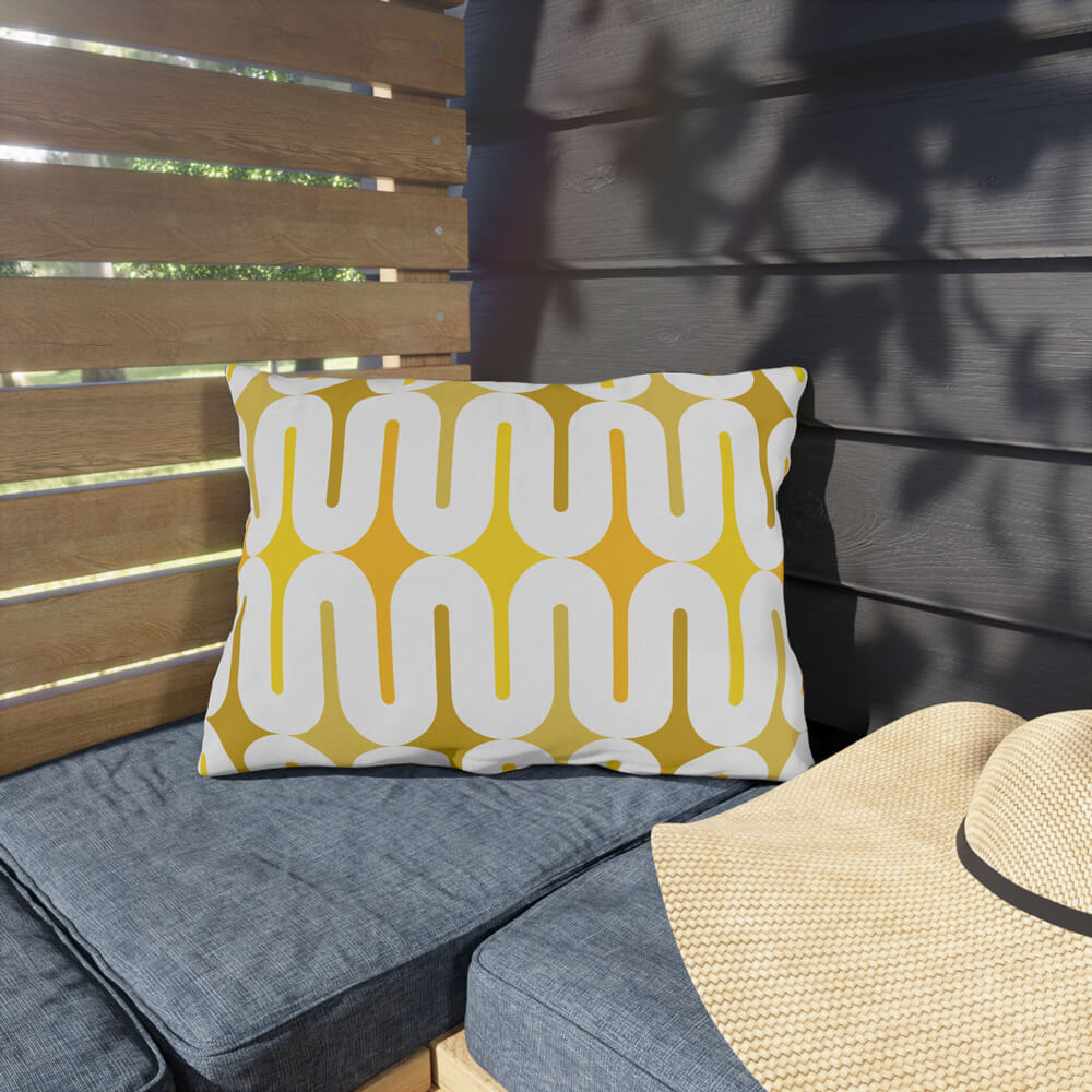 Mid Century Modern Yellow Galaxie 20" x 14" Outdoor Pillow on a bench