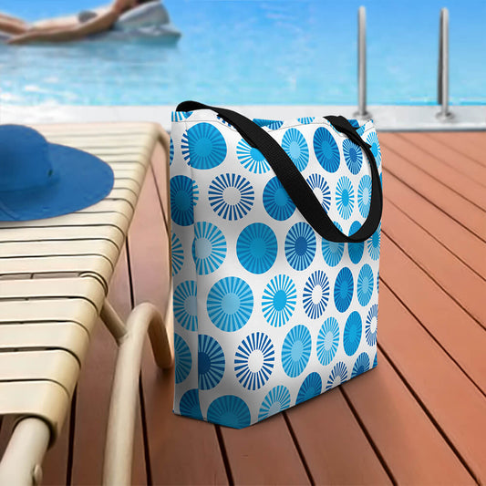 Mid Century Modern Blue FlowerPower Beach Bag on a patio deck