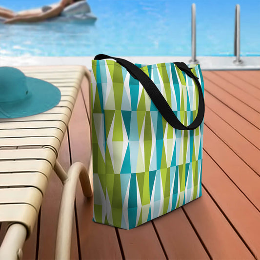 Mid Century Modern Aqua Green LozAnges Beach Bag on a patio deck