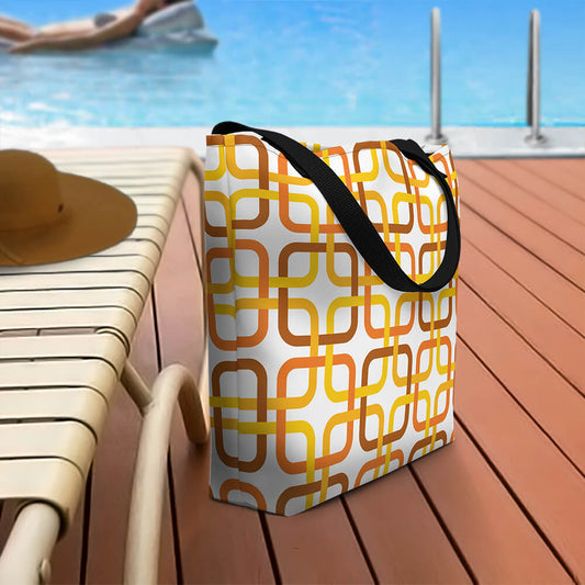 Mid Century Modern Orange PanAmTrays Beach Bag on a pool deck