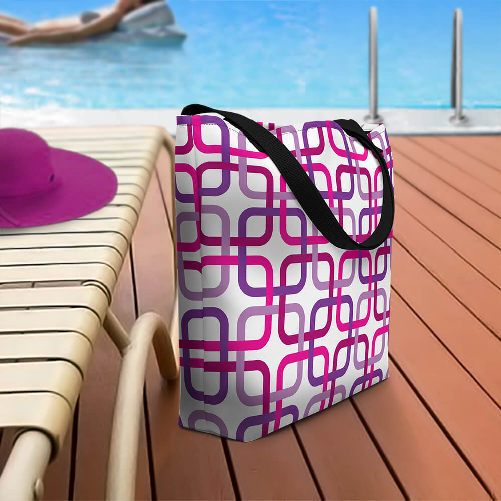 Mid Century Modern Pink PanAmTrays Beach Bag on a pool deck