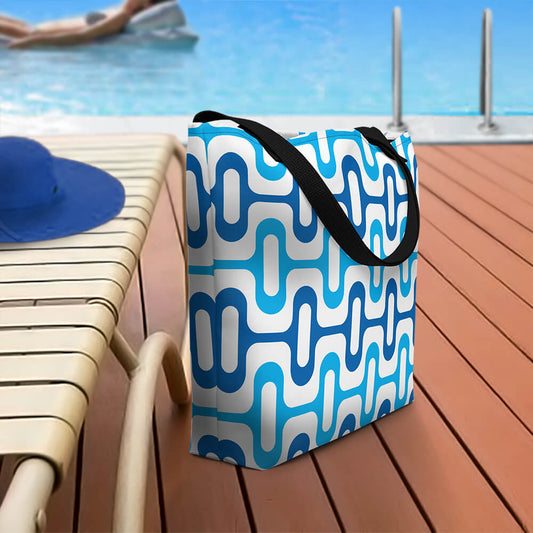 Mid Century Modern Blue ZipperDee Beach Bag on a patio deck