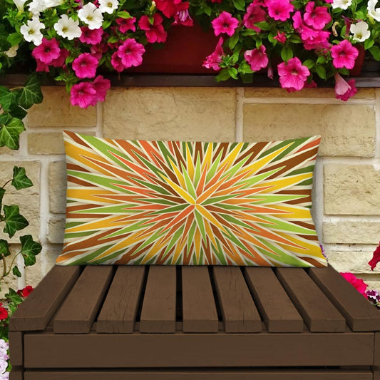 Mid Century Modern Orange Green SpiroBurst 20" x 12" Rectangular Throw Pillow on a patio bench
