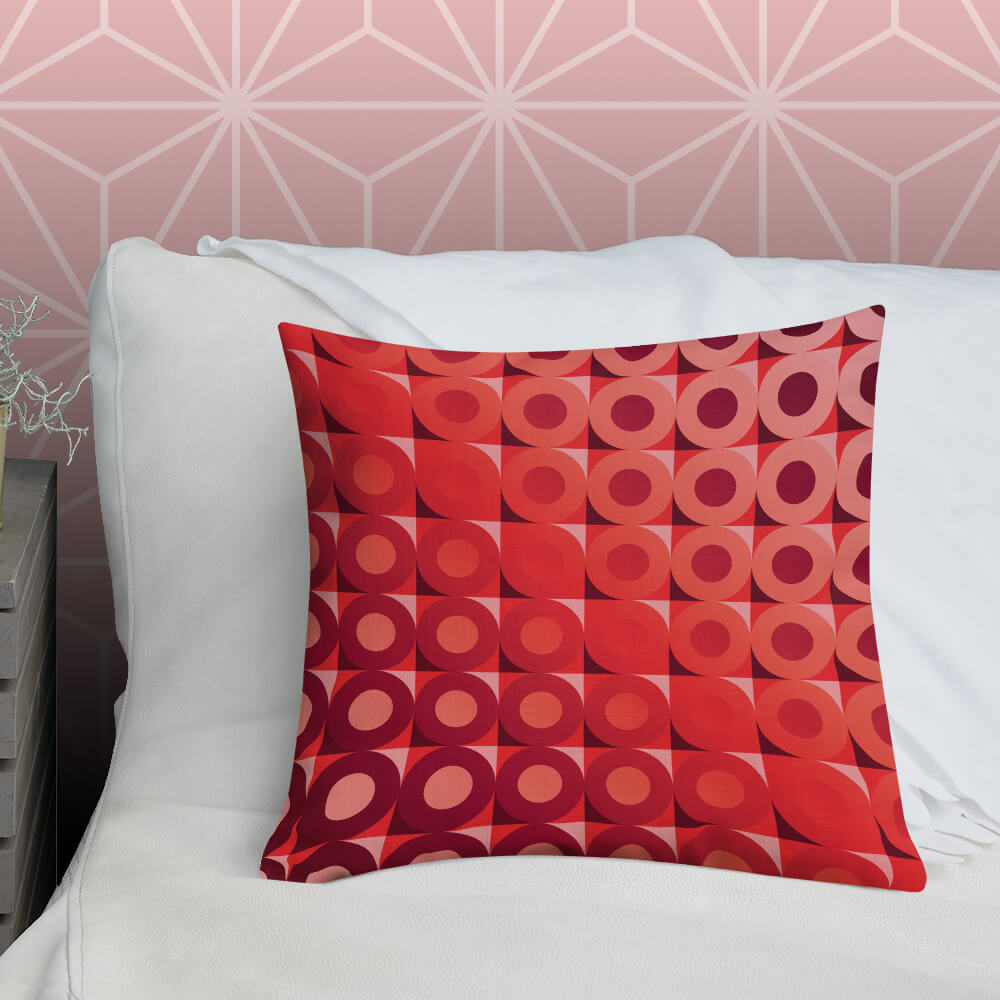 Mid Century Modern Coral Red LifeSavers 18" Square Throw Pillow on a bed