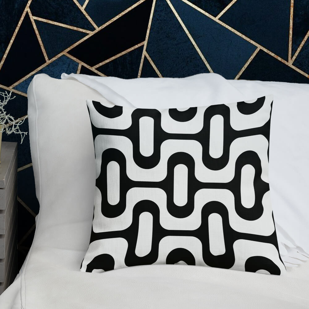 Mid Century Modern Black and White ZipperDee 18" Square Throw Pillow on a bed