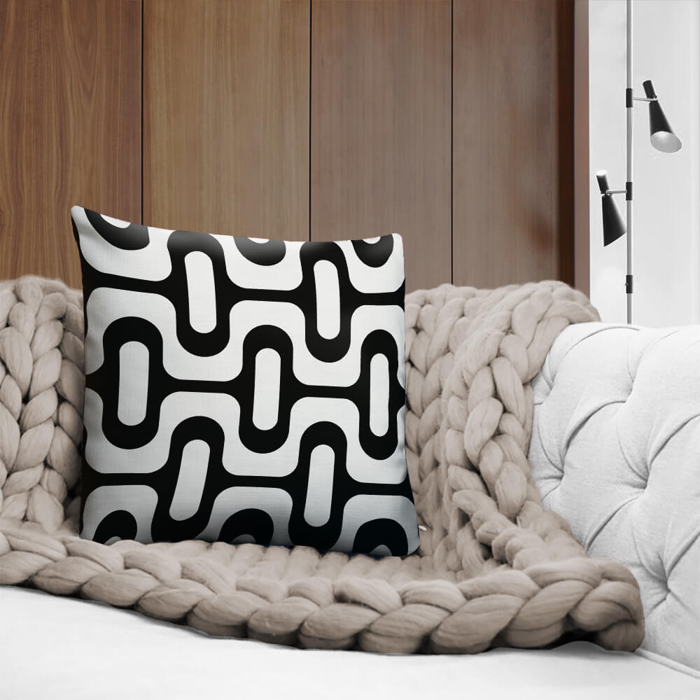 Mid Century Modern Black and White ZipperDee 18" Square Throw Pillow on a sofa