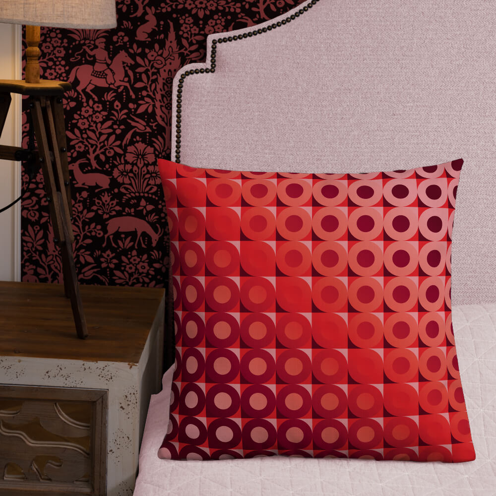 Mid Century Modern Coral Red LifeSavers 22" Square Throw Pillow on a bed