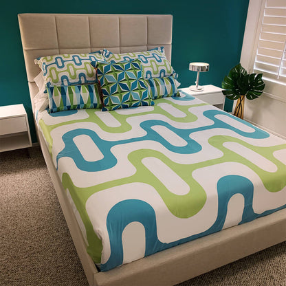 Mid Century Modern Aqua Green ZipperDee Duvet Cover queen size in a bedroom decor with pillows