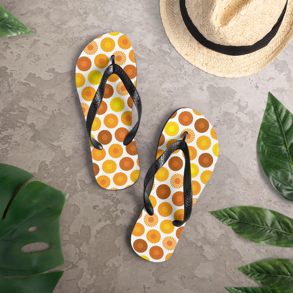 Mid Century Modern Orange FlowerPower Flip-Flops on a deck