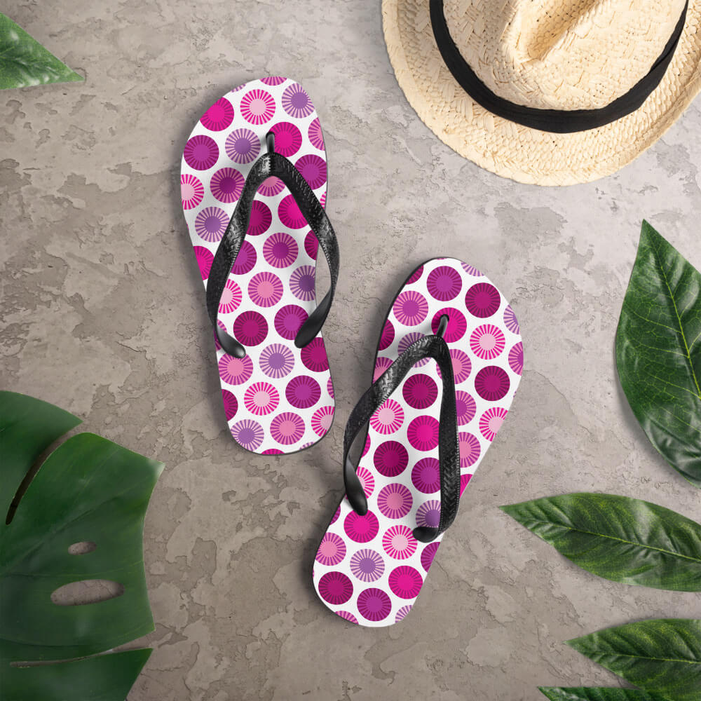 Mid Century Modern Pink FlowerPower Flip-Flops on a deck