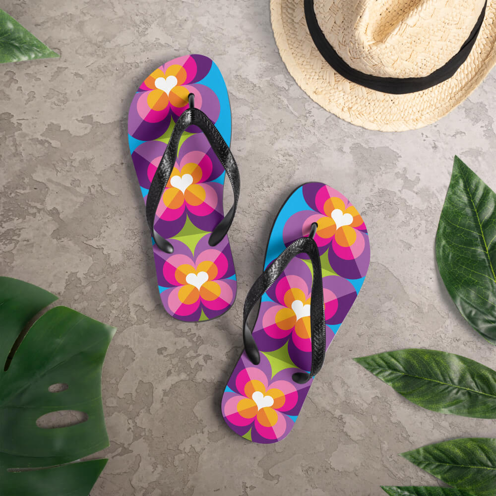Mid Century Modern Purple Blue LoverLeaf Flip-Flops on a deck