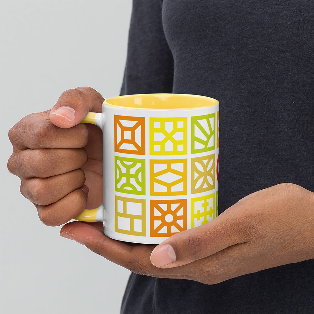 Mid Century Modern Bright Breeze Blocks 11oz Mug with Color Inside in a man's hands
