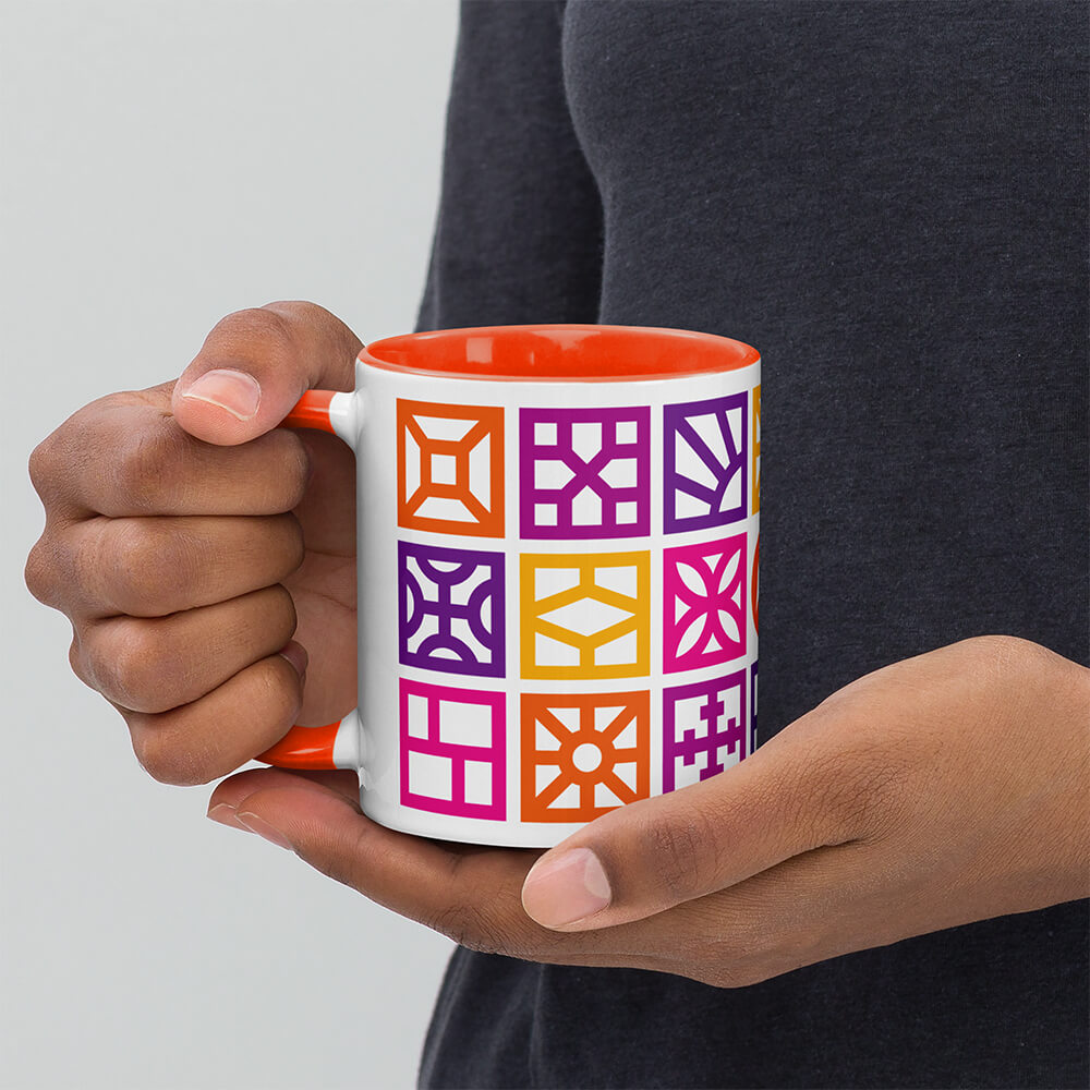 Mid Century Modern Warm Breeze Blocks 11oz Mug with Color Inside in a man's hands