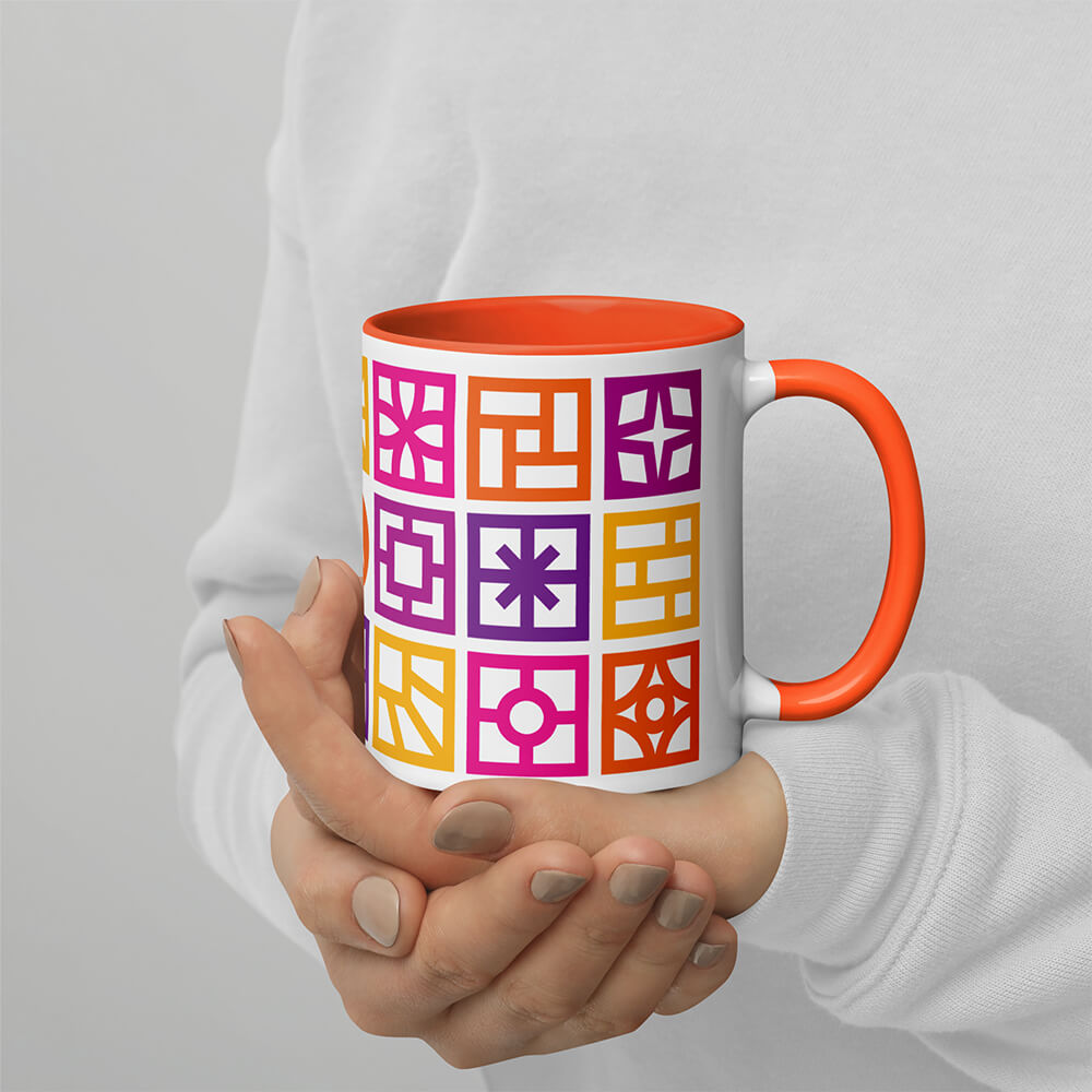Mid Century Modern Warm Breeze Blocks 11oz Mug with Color Inside in a woman's hands