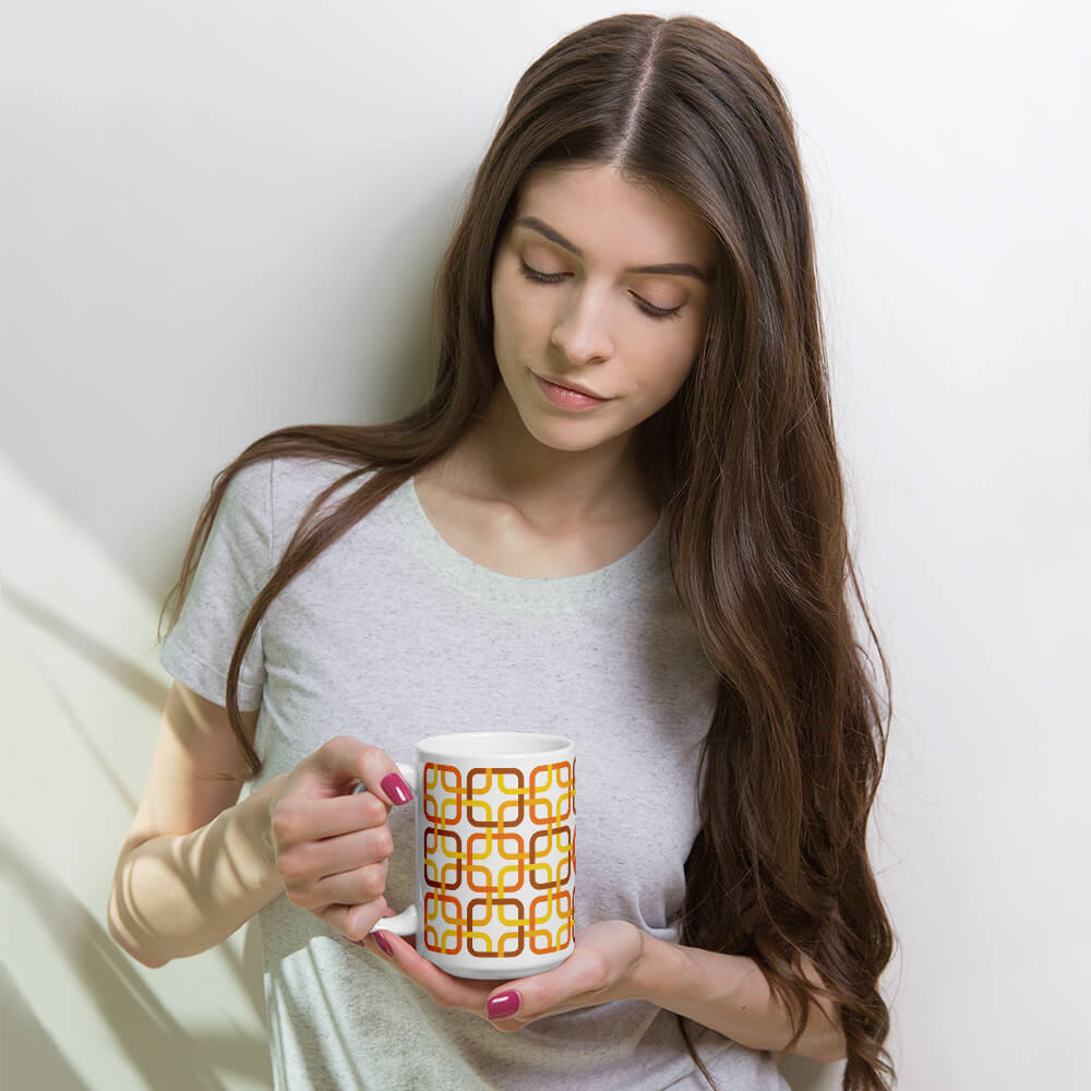 Mid Century Modern Orange PanAmTrays 15oz Mug in the hands of a woman