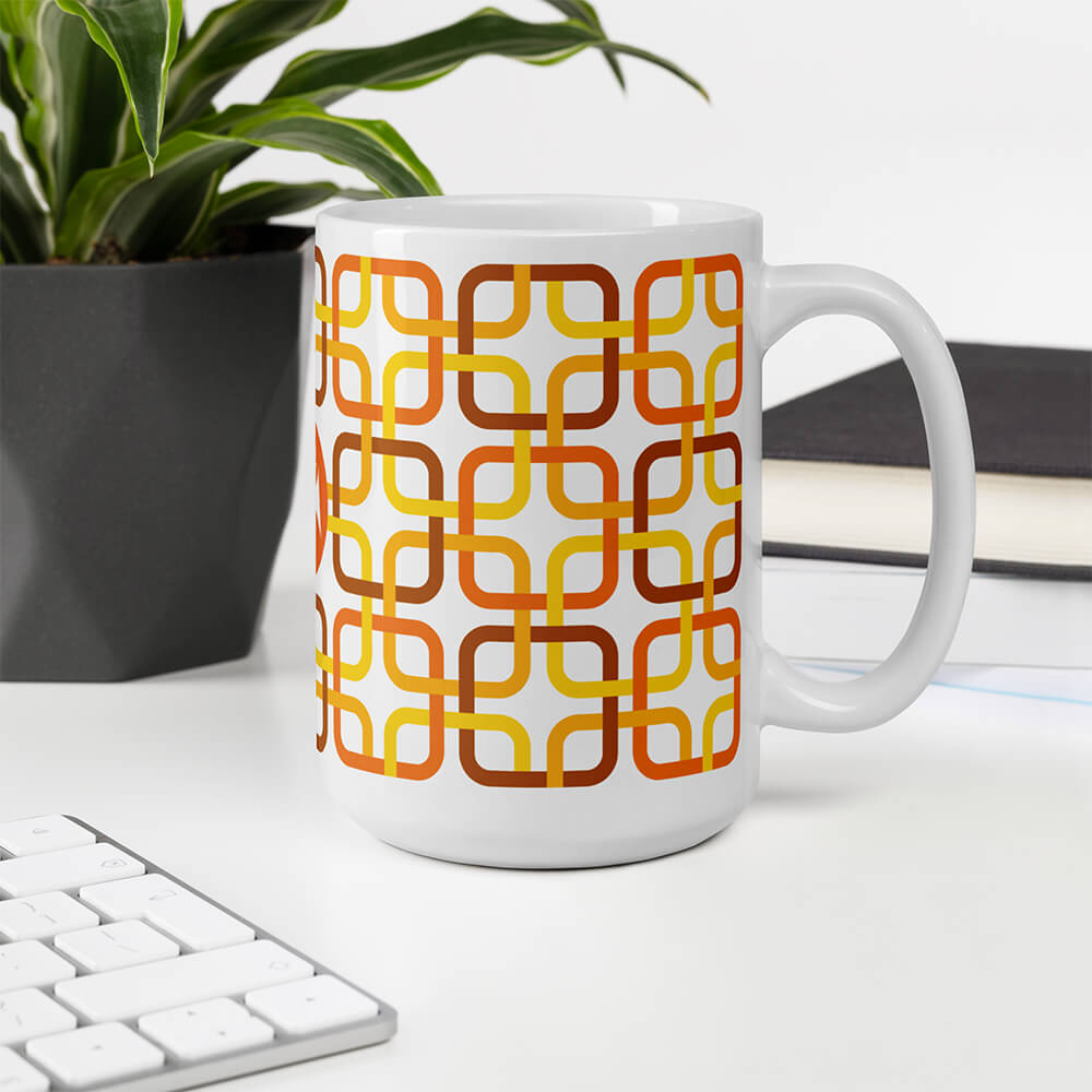 Mid Century Modern Orange PanAmTrays 15oz Mug on an office desk
