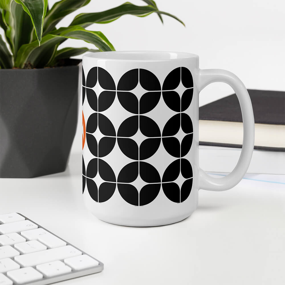 Mid Century Modern Black and White StarChips 15oz Mug on an office desk