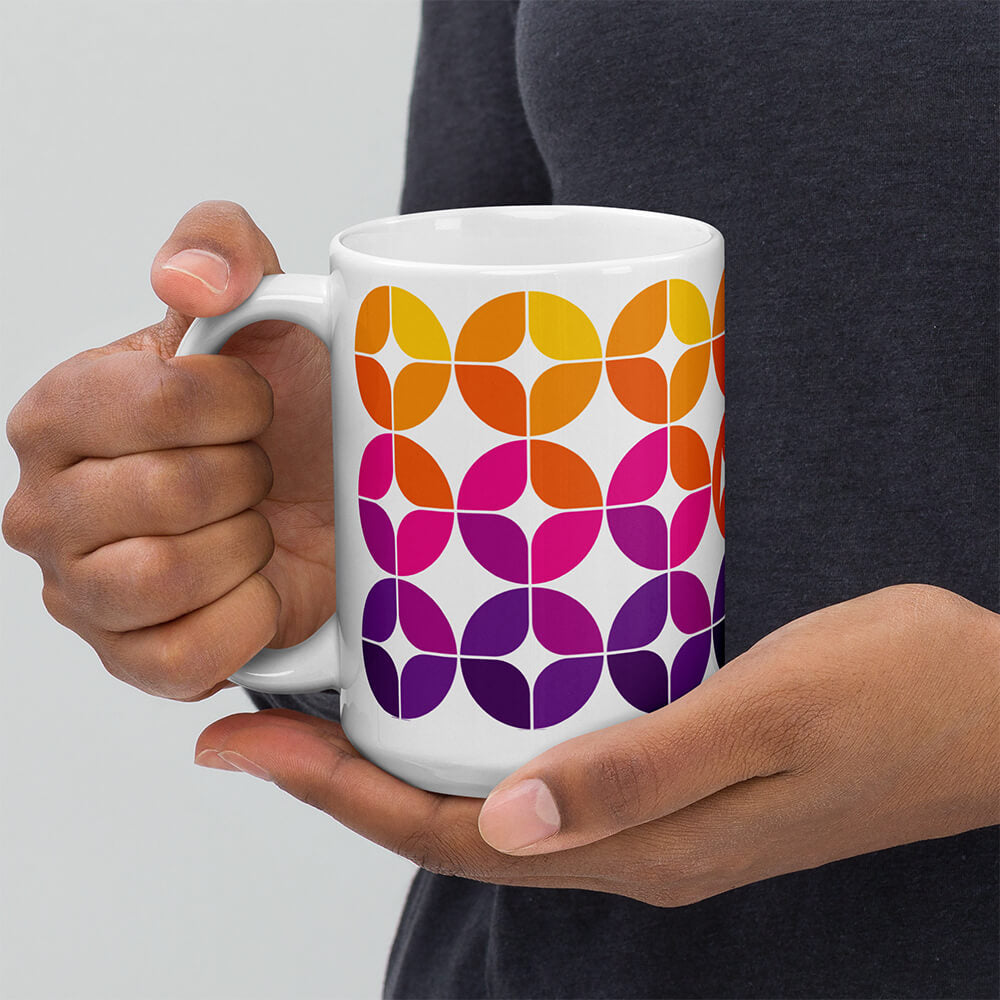 Mid Century Modern Purple Pink Orange StarChips 15oz Mug in a man's hands