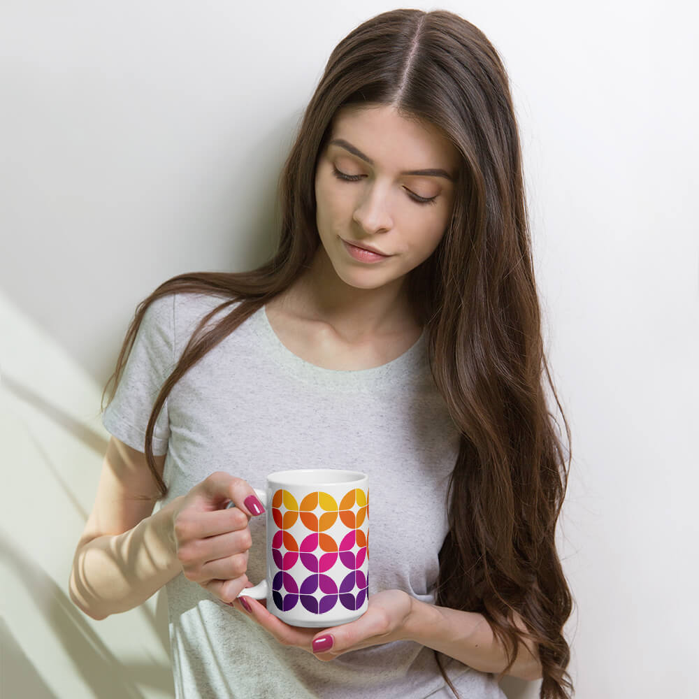 Mid Century Modern Purple Pink Orange StarChips 15oz Mug in a woman's hands
