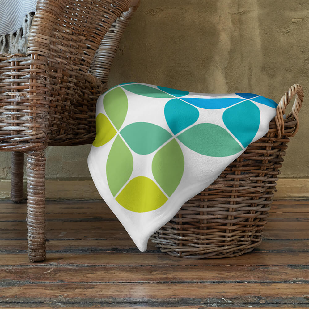 Mid Century Modern Blue Aqua StarChips 60" x 80" Throw Blanket in a basket