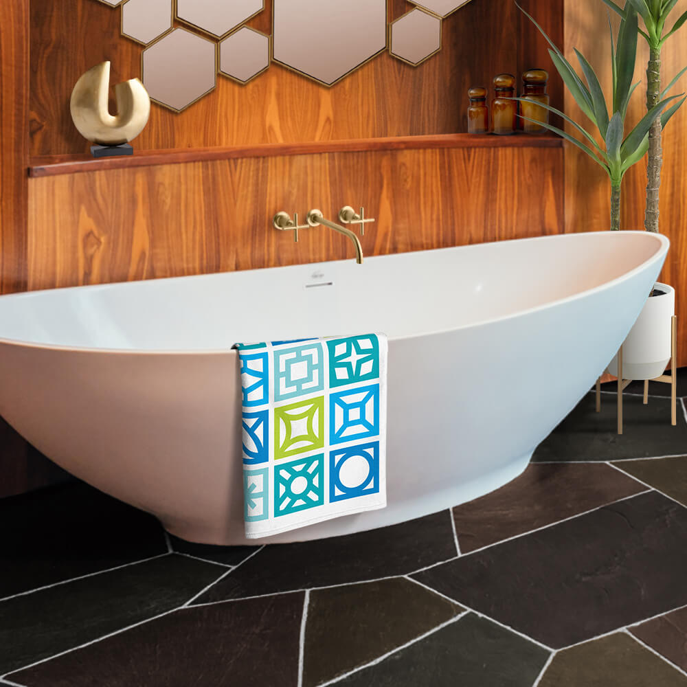 Mid Century Modern Blue Breeze Blocks Beach & Pool Towel in a bathroom