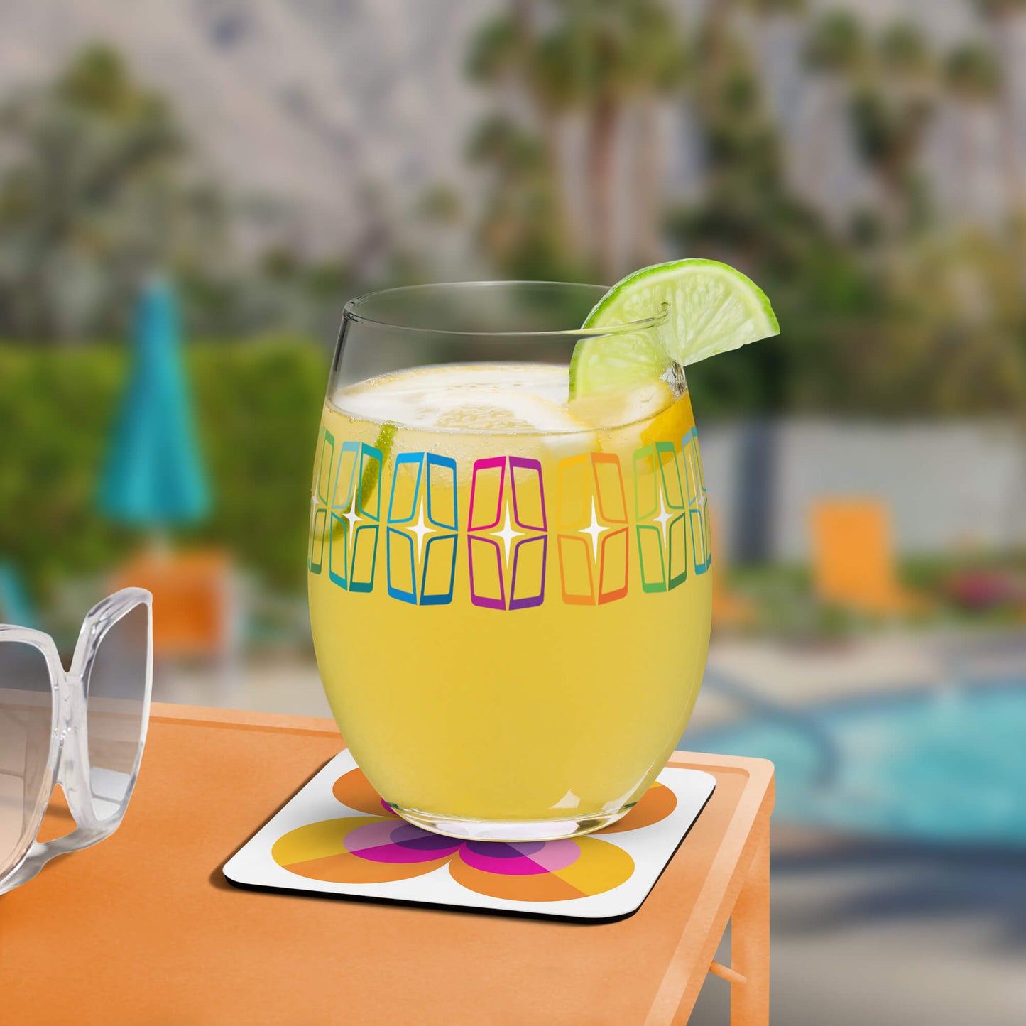 Mid Century Modern Orange LoverLeaf Square Coaster with cocktail at the pool