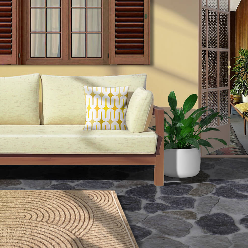 Mid Century Modern Yellow Galaxie 18" Outdoor Pillow on patio sofa