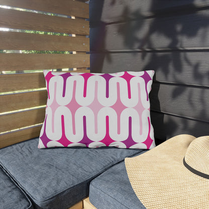 Mid Century Modern Pink Galaxie 20" x 14" Outdoor Pillow on a bench
