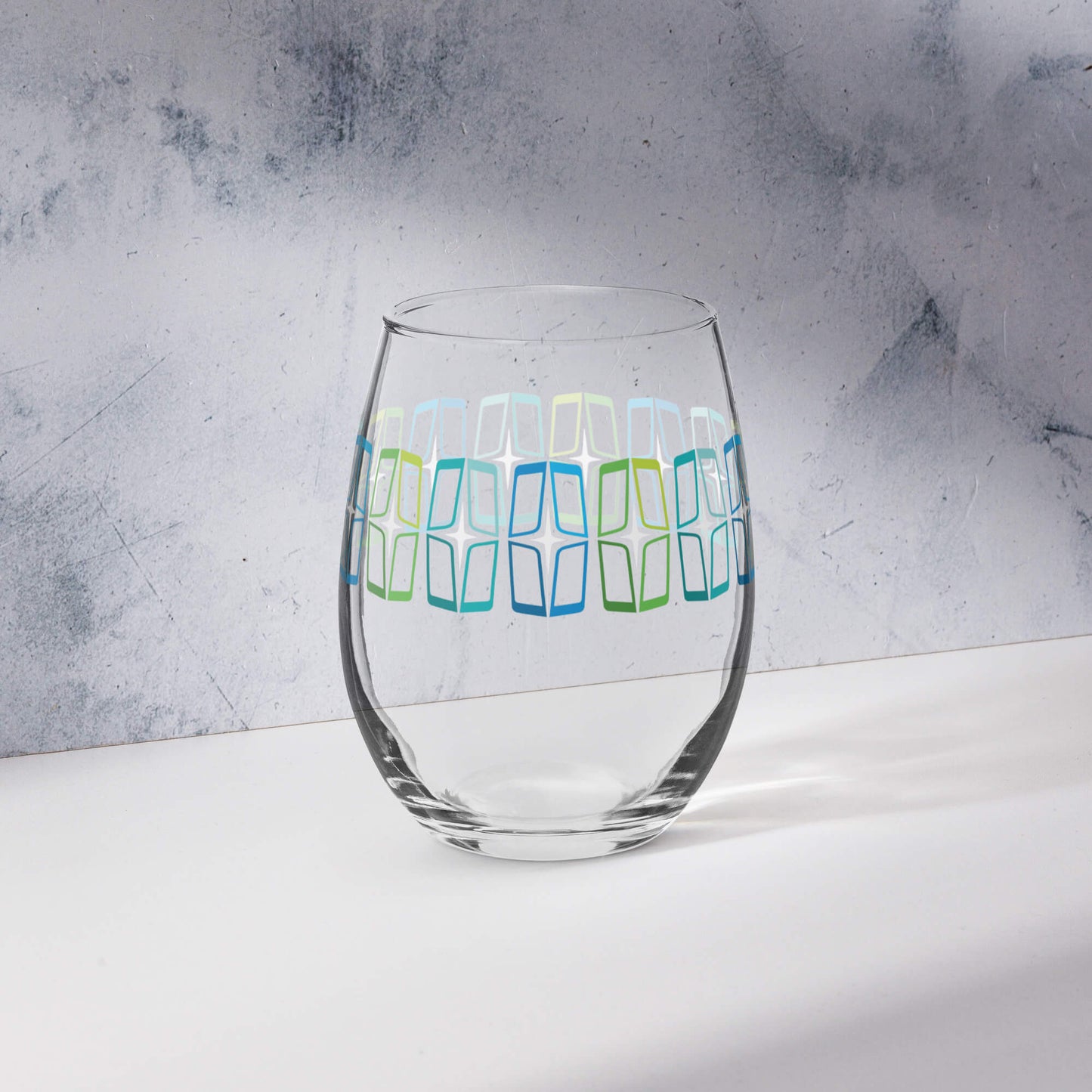 https://midcentury.style/cdn/shop/files/mid-century-modern-wine-stemless-glass-15oz-astroshields-blue-marble.jpg?v=1691085161&width=1445