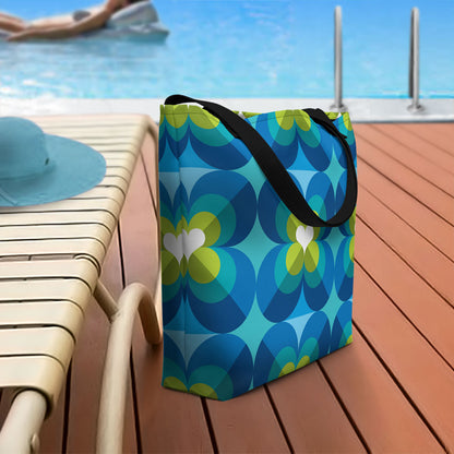 Mid Century Modern Aqua Blue LoverLeaf Beach Bag on a pool deck
