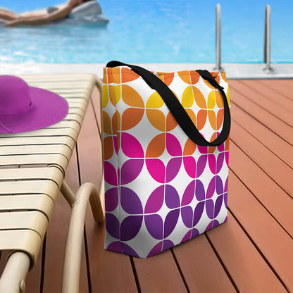 Mid Century Modern Purple Orange StarChips Beach Bag on a pool deck