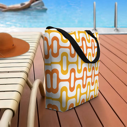 Mid Century Modern Orange ZipperDee Beach Bag on a pool deck