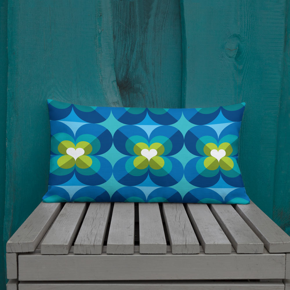 Mid Century Modern Aqua Blue LoverLeaf 20" x 12" Rectangular Cushion Throw Pillow on a patio bench