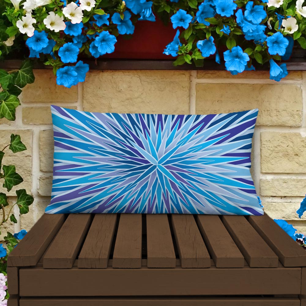 Mid Century Modern Blue Indigo SpiroBurst 20" x 12" Rectangular Throw Pillow on a patio bench