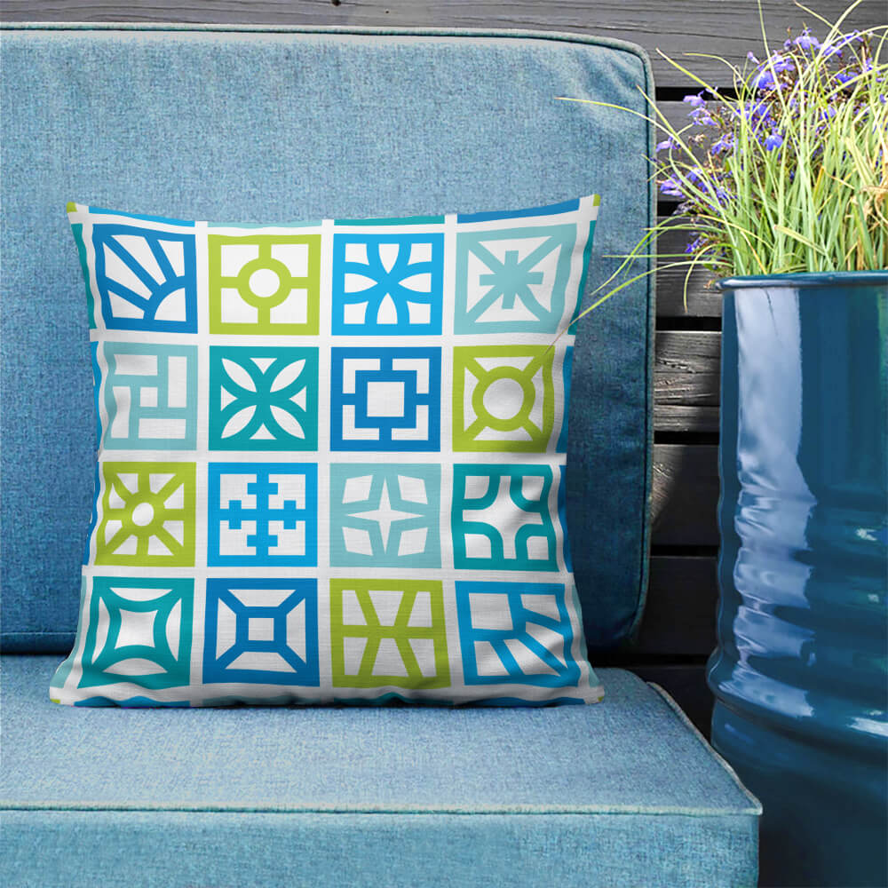 Mid Century Modern Blue Breeze Blocks 18" Square Throw Pillow on a patio bench