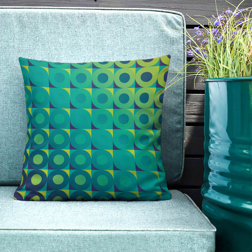 Mid Century Modern Aqua Green LifeSavers 18" Square Throw Pillow on a patio bench