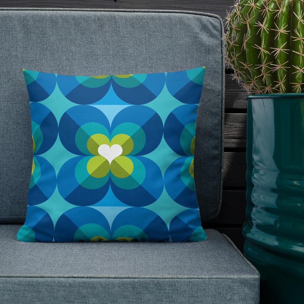 Mid Century Modern Aqua Blue LoverLeaf 18" Square Cushion Throw Pillow on a patio sofa