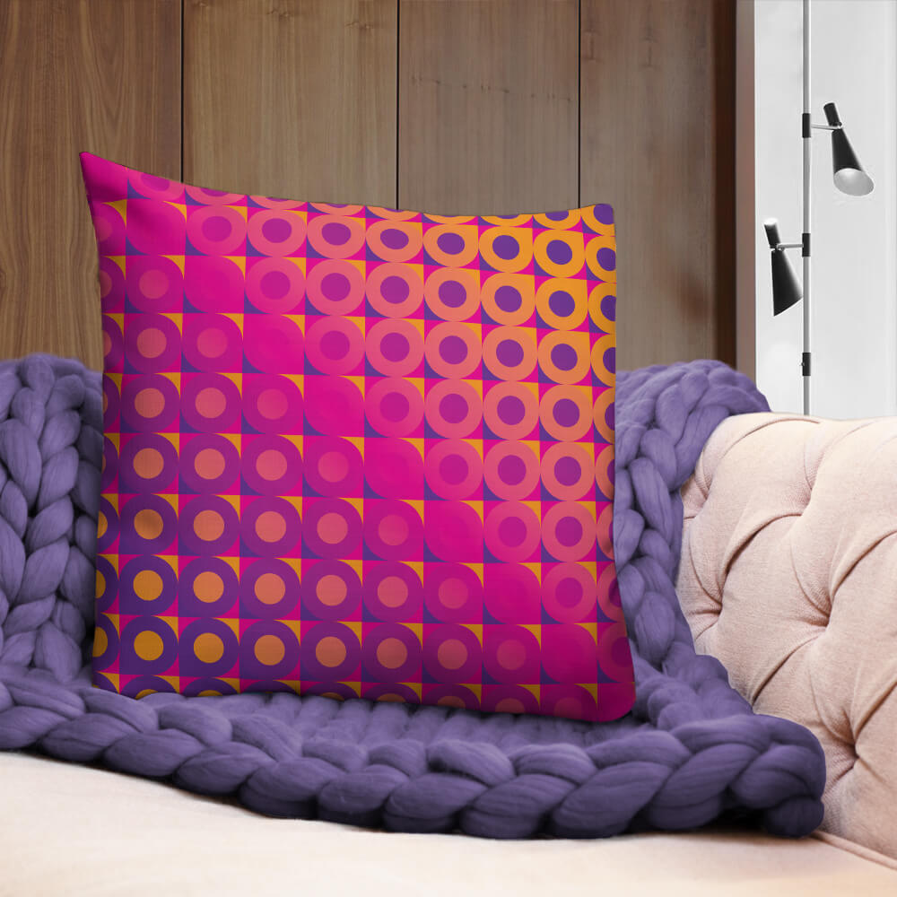Mid Century Modern Orange Pink LifeSavers 22" Square Throw Pillow on a sofa