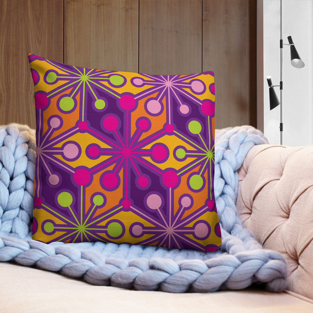 Mid Century Modern Multicolour PsychoFlakes 22" Square Throw Pillow on a sofa