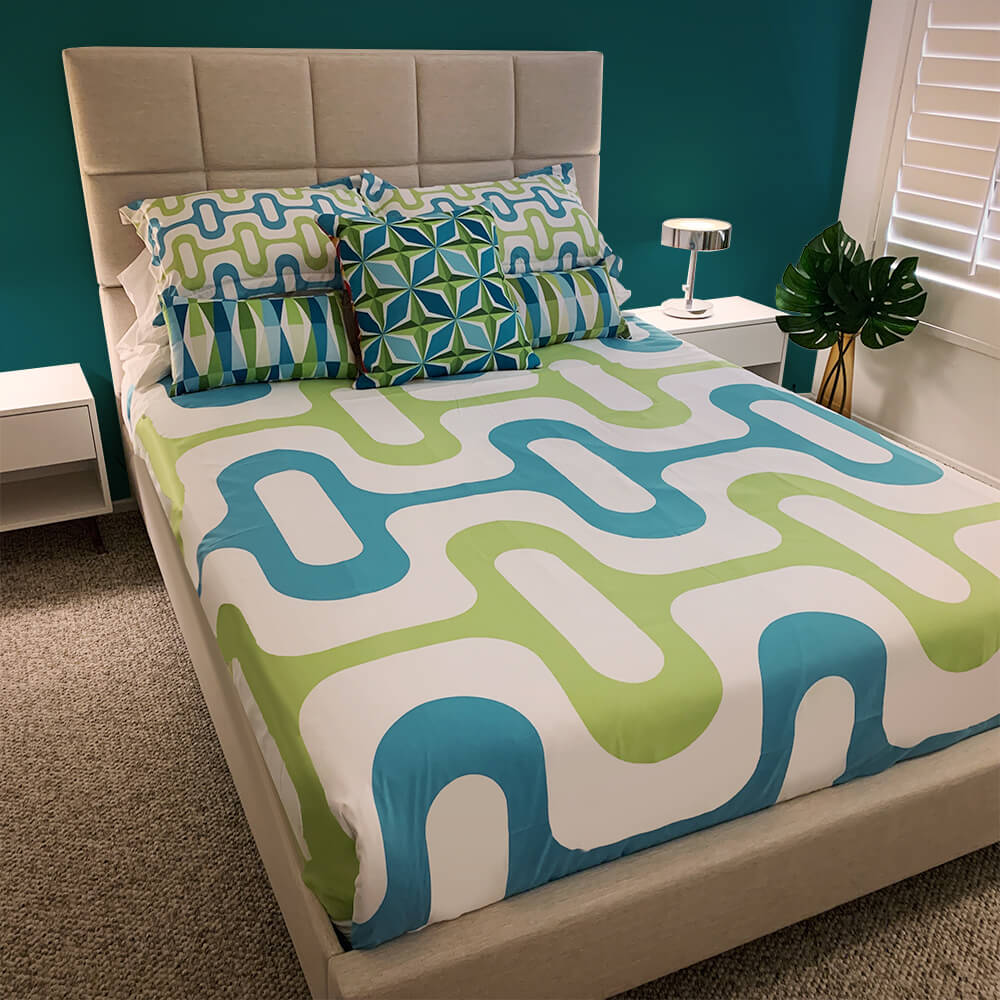 Mid Century Modern Aqua Green ZipperDee Duvet Cover queen size in a bedroom decor with pillows