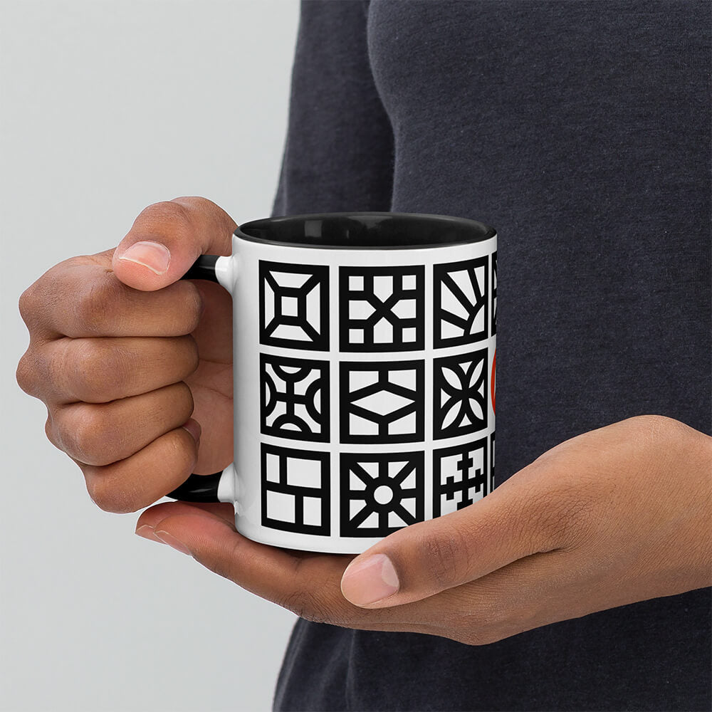 Mid Century Modern Black and White Breeze Blocks 11oz Mug with Color Inside in a boy's hands
