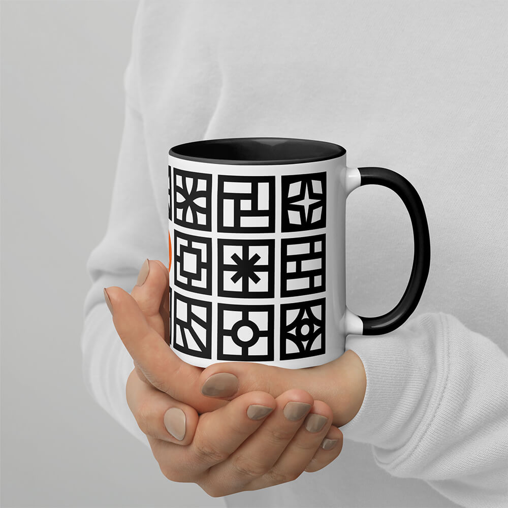 Mid Century Modern Black and White Breeze Blocks 11oz Mug with Color Inside in a girl's hands
