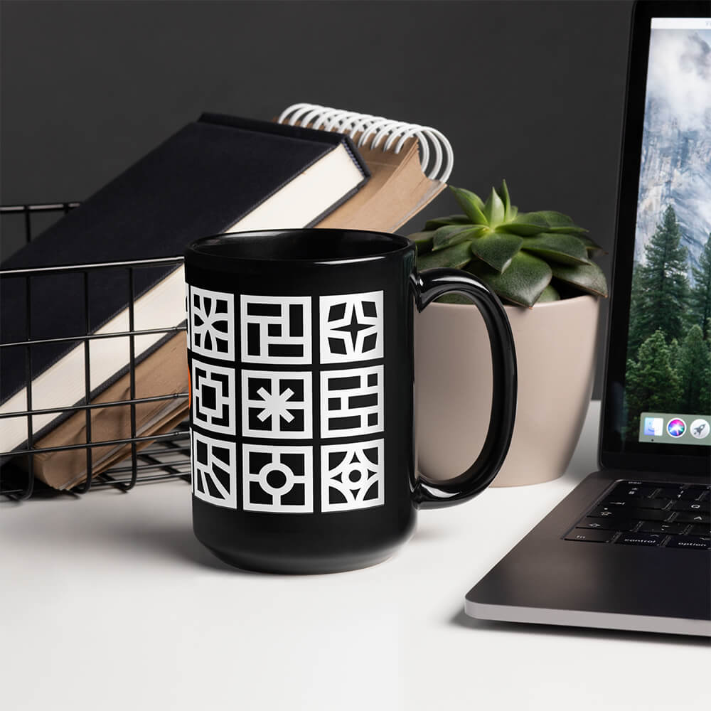Mid Century Modern Black and White Breeze Blocks 15oz Mug on a desk with laptop
