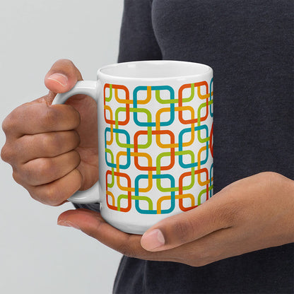 Mid Century Modern Multicolour PanAmTrays 15oz Mug in the hands of a man