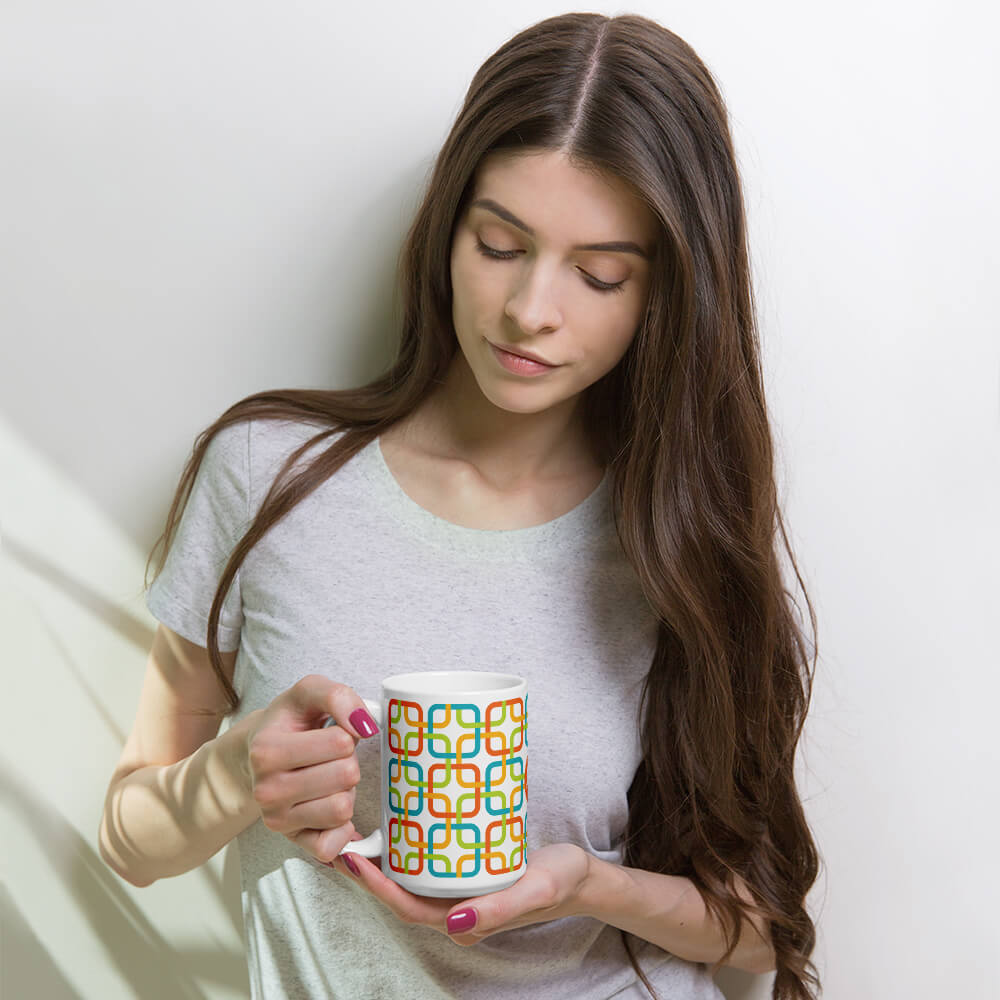 Mid Century Modern Multicolour PanAmTrays 15oz Mug in the hands of a woman