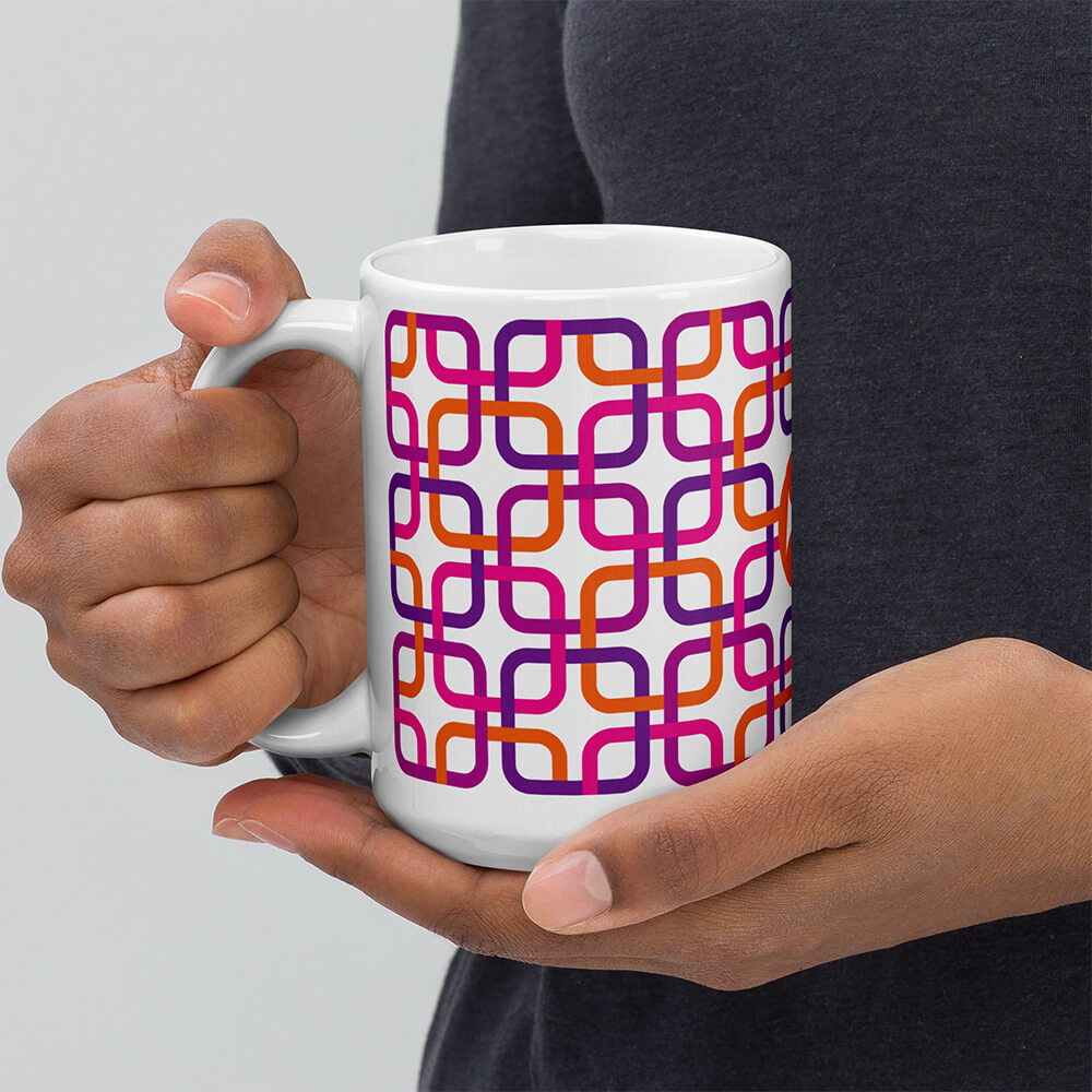 Mid Century Modern Pink PanAmTrays 15oz Mug in the hands of a man