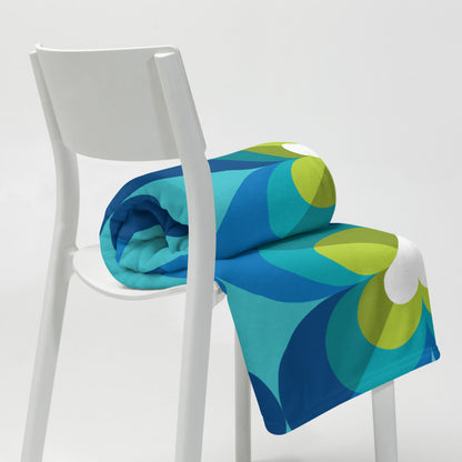Mid Century Modern Aqua Blue LoverLeaf 50" x 60" Throw Blanket rolled on a chair